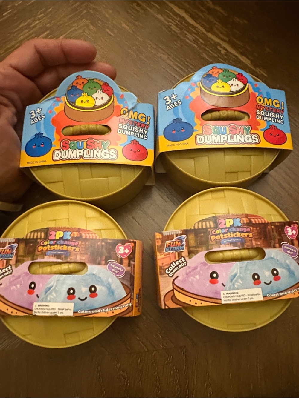 NIB SET OF 4 Squishy mystery Dumplings& color changing potstickers price firm$32